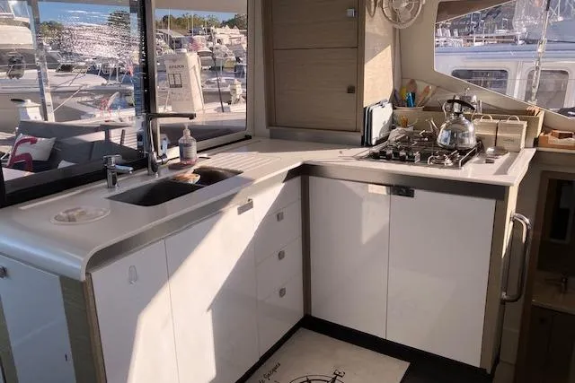 Slide: The Image of Modern kitchen in 2021 Fountaine Pajot Isla 40 catamaran with stove and sink. - 5