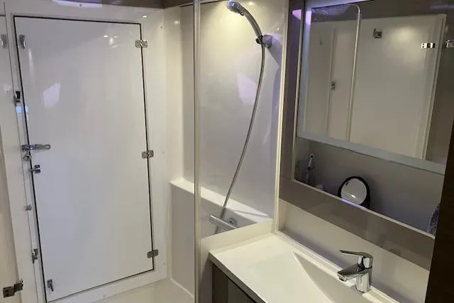 Slide: The Image of Modern bathroom interior of 2021 Fountaine Pajot Isla 40 catamaran with shower and sink. - 7