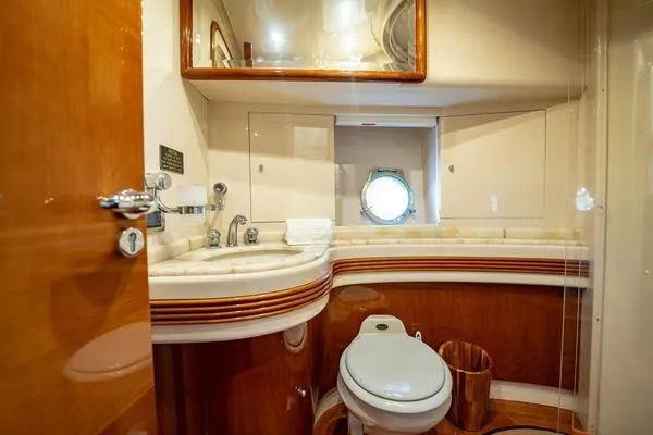 Slide: The Image of Luxurious bathroom interior of 2003 Azimut 80 Carat yacht with elegant wood finishes. - 10