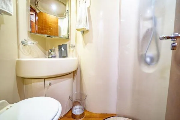 Slide: The Image of Luxurious bathroom interior of 2003 Azimut 80 Carat yacht, featuring modern amenities. - 11