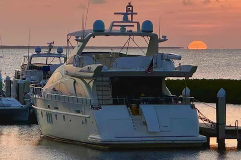 Slide: The Image of Luxury Azimut 80 Carat yacht docked at sunset, 2003 model. - 2