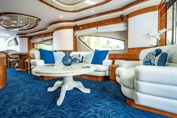Slide: The Image of Luxurious interior of 2003 Azimut 80 Carat yacht with elegant seating and decor. - 48