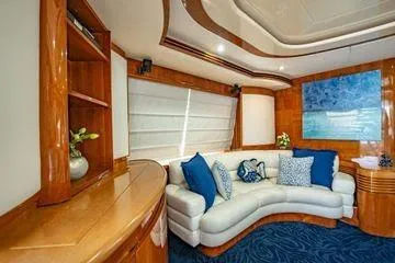 Slide: The Image of Luxurious interior of 2003 Azimut 80 Carat yacht with elegant seating and decor. - 51