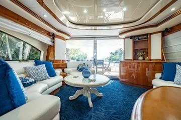Slide: The Image of Luxurious interior of 2003 Azimut 80 Carat yacht with elegant seating and decor. - 52