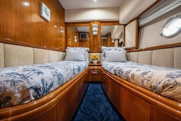 Slide: The Image of Luxurious twin cabin interior of 2003 Azimut 80 Carat yacht with elegant wood finish. - 6