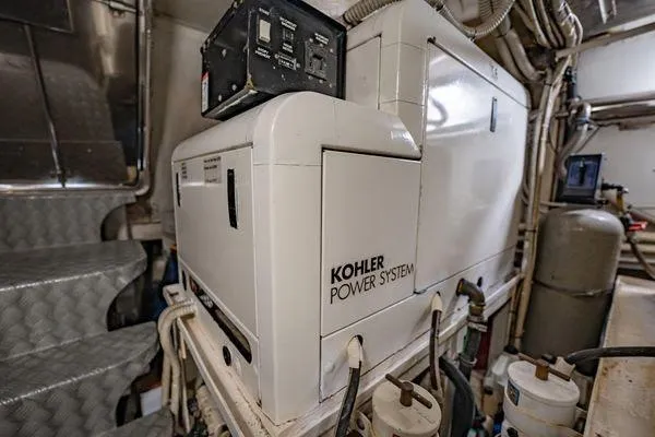 Slide: The Image of Engine room of 2003 Azimut 80 Carat yacht featuring Kohler power system. - 65