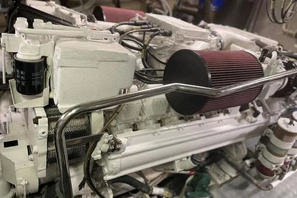 Slide: The Image of Engine of 2003 Azimut 80 Carat yacht with visible components and filters. - 68