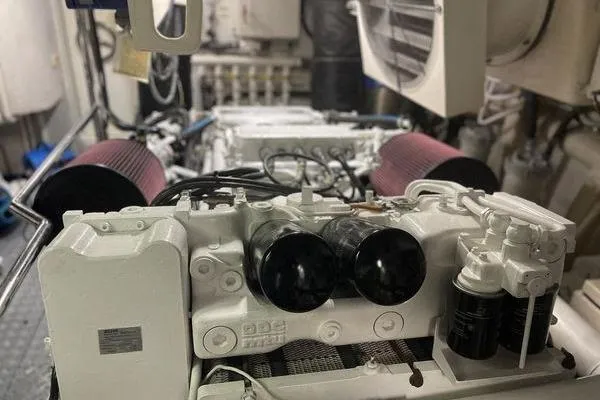 Slide: The Image of Engine room of 2003 Azimut 80 Carat yacht with visible components and filters. - 70