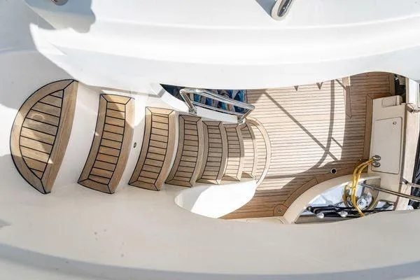 Slide: The Image of Staircase on 2003 Azimut 80 Carat yacht with elegant wooden deck design. - 73