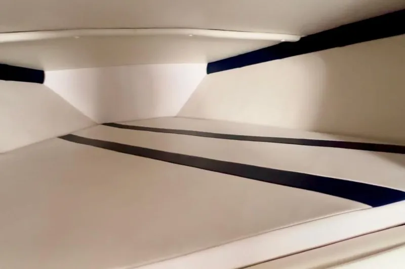Slide: The Image of Interior cabin of 2015 Donzi 38 ZR boat, featuring sleek, modern design. - 12