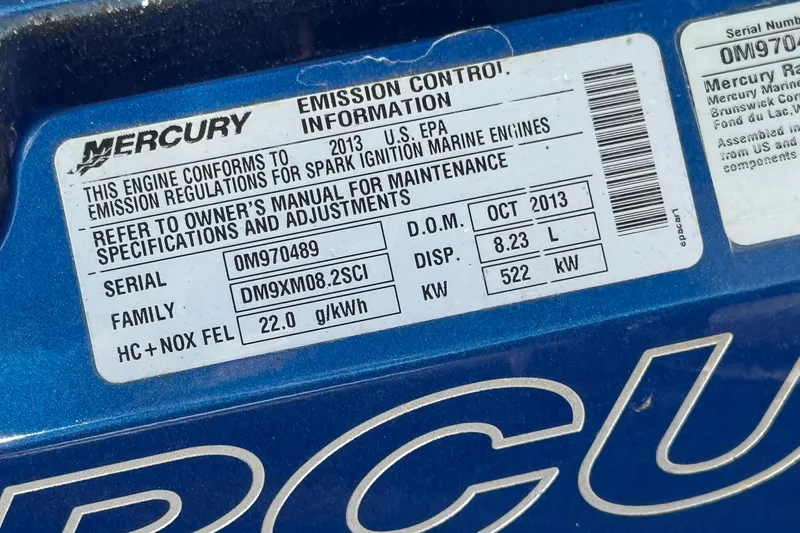 Slide: The Image of Emission control label on a 2015 Donzi 38 ZR boat engine. - 13