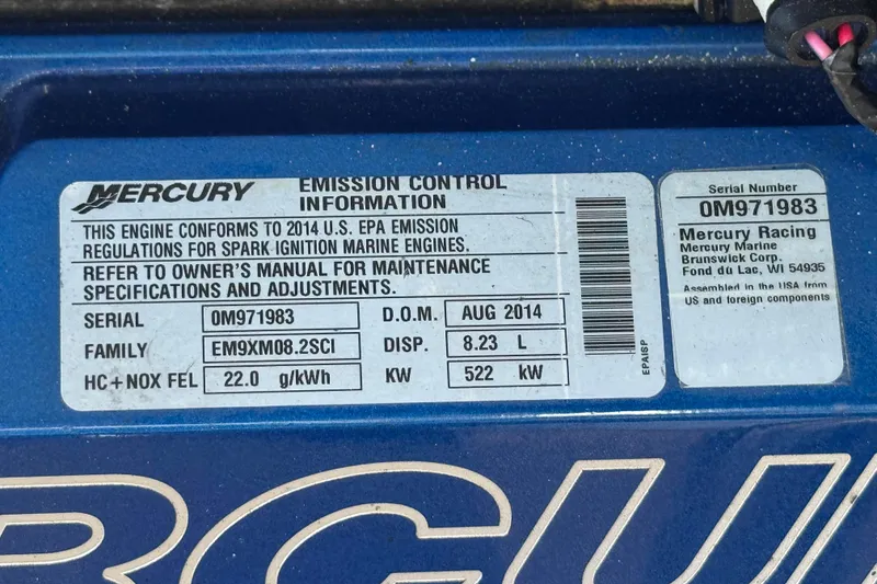 Slide: The Image of 2015 Donzi 38 ZR Mercury engine emission control label, serial 0M971983, 8.23L, 522 kW. - 16