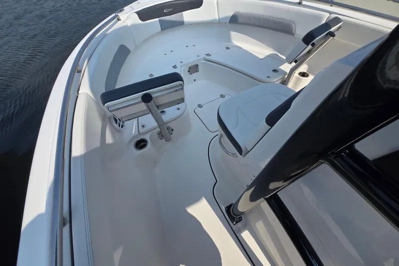 Slide: The Image of 2022 Robalo R222 Center Console boat interior with seating and console details. - 6