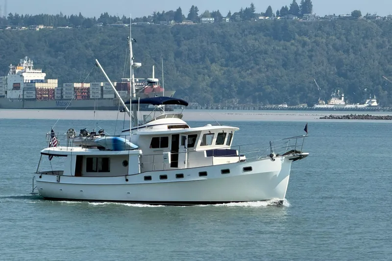 Slide: The Image of 1998 Kadey-Krogen 48' Northsea Widebody Pilothouse cruising in scenic waters. - 38