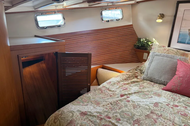 Slide: The Image of Cozy bedroom in 1998 Kadey-Krogen 48' Northsea Widebody Pilothouse with floral bedding. - 21