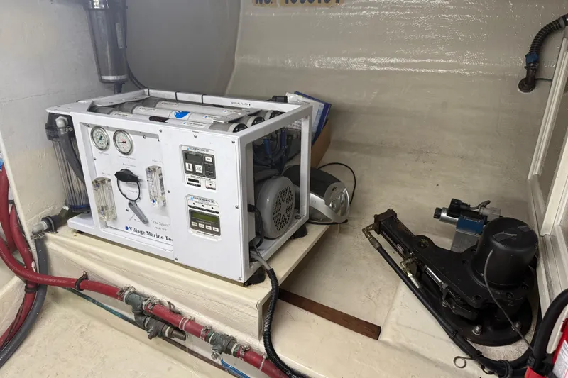 Slide: The Image of Engine room of 1998 Kadey-Krogen 48' Northsea Widebody Pilothouse with marine equipment. - 31