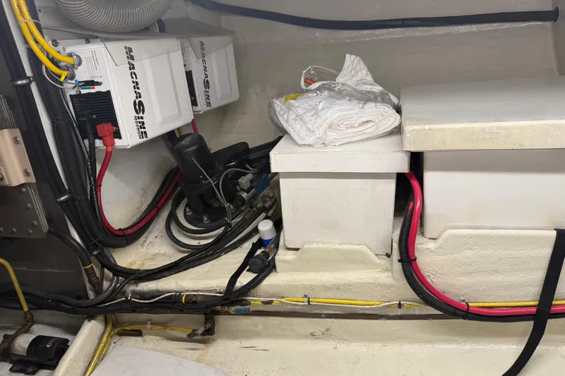 Slide: The Image of Engine room of 1998 Kadey-Krogen 48' Northsea Widebody Pilothouse with electrical components and wiring. - 35