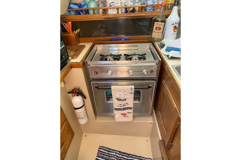 Slide: The Image of propane stove and oven - 11