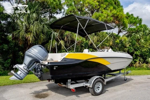 Slide: The Image of 2022 Starcraft SVX 191 OB boat on trailer, featuring a sleek design and outboard motor. - 3