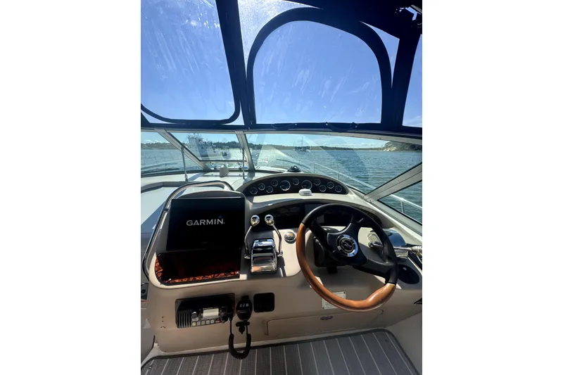 Slide: The Image of Cockpit view of 2002 Sea Ray 340 Sundancer with Garmin navigation system. - 4