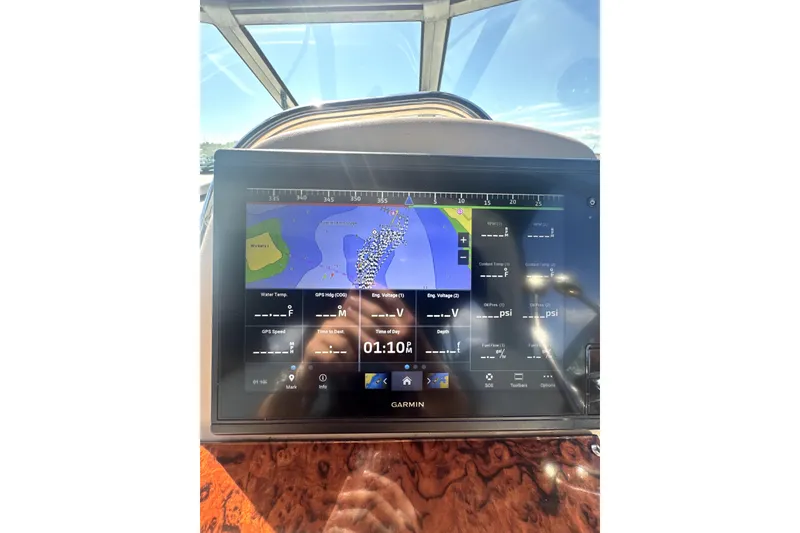 Slide: The Image of Garmin navigation display on 2002 Sea Ray 340 Sundancer boat dashboard. - 5