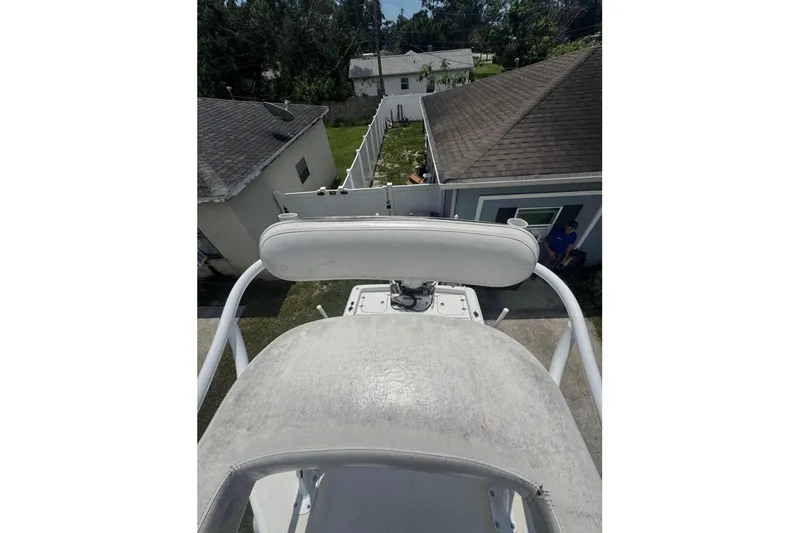 Slide: The Image of 2016 Sea Hunt BX 24 BR boat view from above, overlooking residential area. - 12
