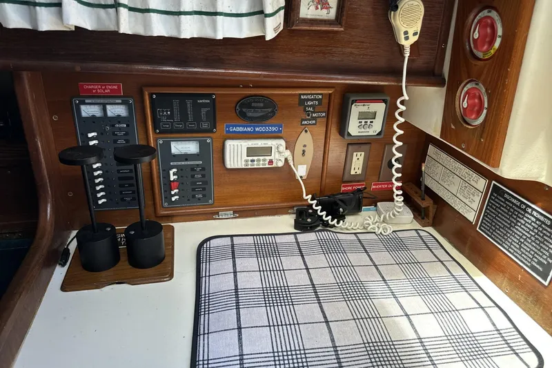 Slide: The Image of Control panel of a 1982 Cape Dory 30 sailboat with navigation and communication equipment. - 18