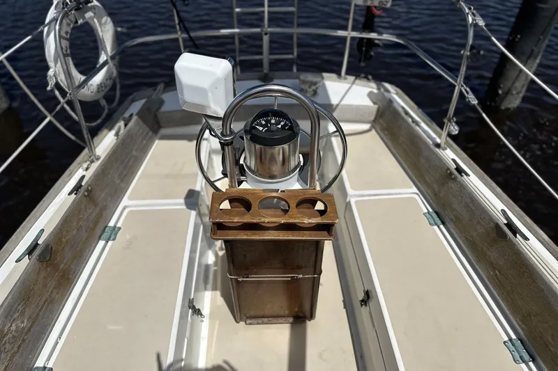 Slide: The Image of Cockpit of 1982 Cape Dory 30 sailboat with steering wheel and compass. - 5