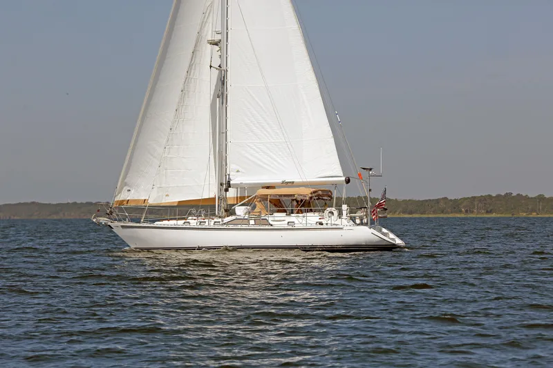 Slide: The Image of Sailing yacht Hylas 49CC 2012 gliding on calm waters under clear skies. - 1