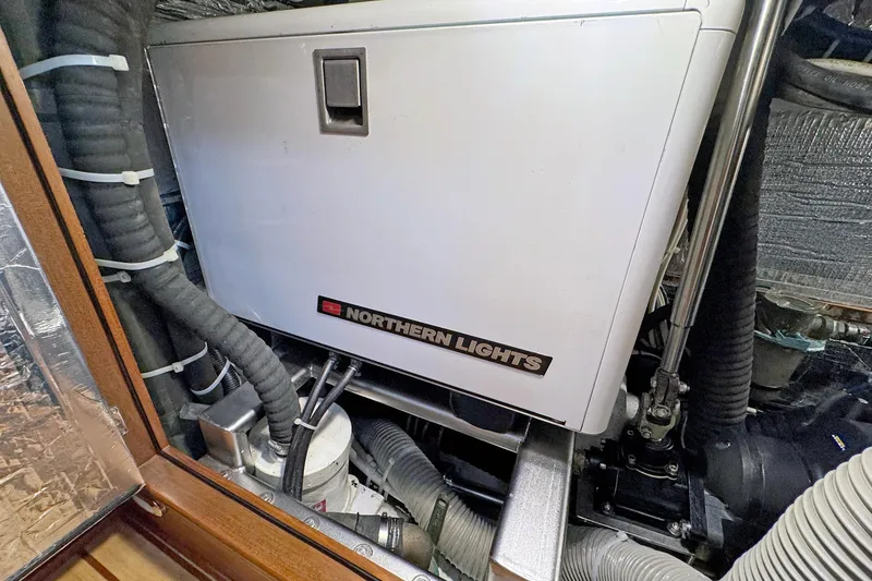 Slide: The Image of Engine room of a 2012 Hylas 49CC yacht with Northern Lights generator. - 142