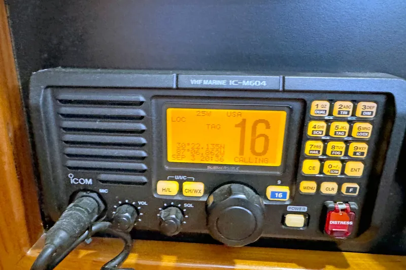 Slide: The Image of VHF marine radio IC-M604 on Hylas 49CC, 2012 model, displaying channel 16. - 167