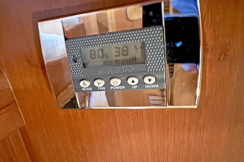 Slide: The Image of Thermostat control panel on Hylas 49CC yacht, displaying temperature settings. - 173