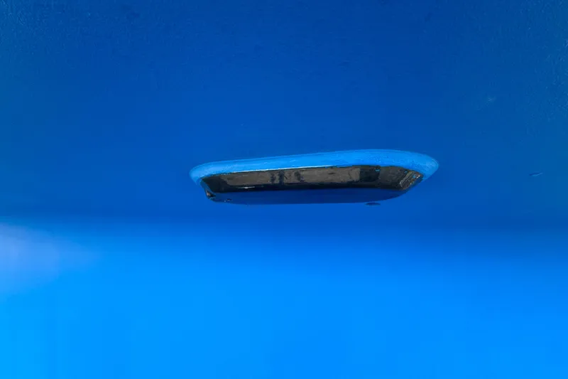 Slide: The Image of Blue hull of 2012 Hylas 49CC boat with underwater fitting. - 188