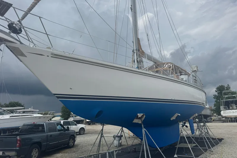 Slide: The Image of Sailboat Hylas 49CC 2012 on stands, cloudy sky background. - 192