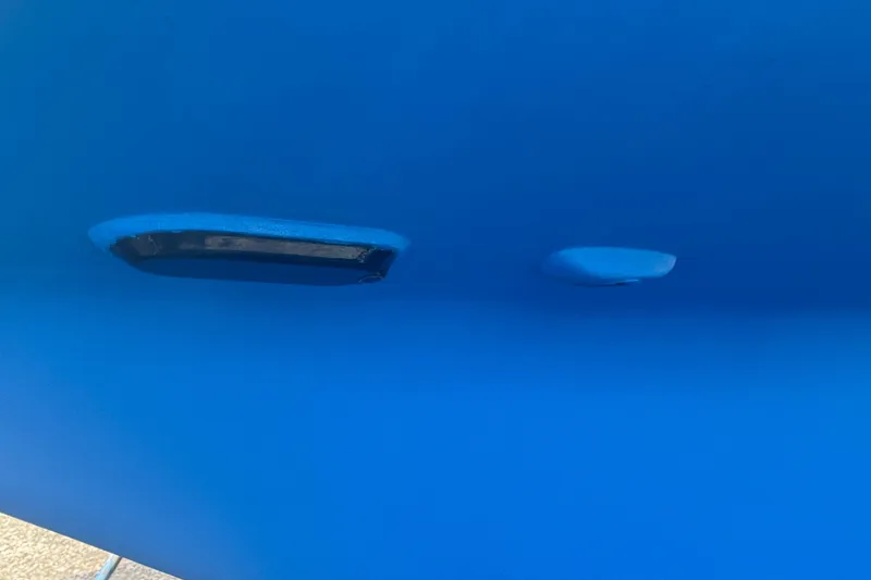 Slide: The Image of Blue hull of a 2012 Hylas 49CC boat with underwater fittings. - 199