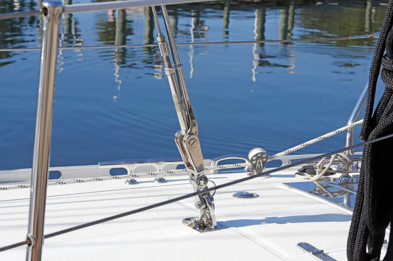 Slide: The Image of Deck of 2012 Hylas 49CC sailboat with rigging and calm water reflection. - 20