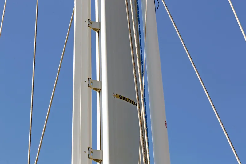 Slide: The Image of Mast of 2012 Hylas 49CC sailboat with rigging against clear blue sky. - 25