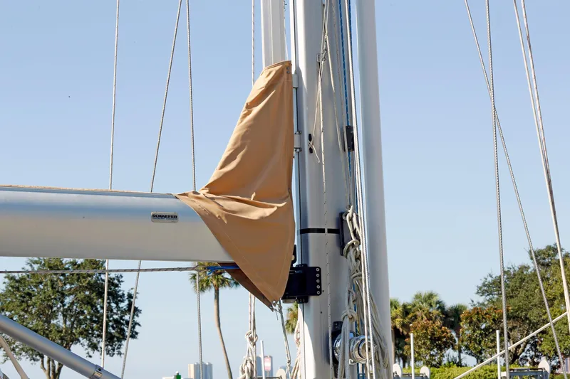 Slide: The Image of Mast and boom of 2012 Hylas 49CC sailboat with tan sail cover. - 26