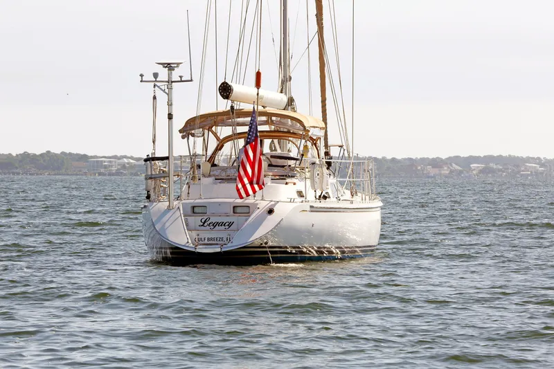 Slide: The Image of Sailboat "Legacy" on water, Hylas 49CC, 2012 model, with American flag. - 3