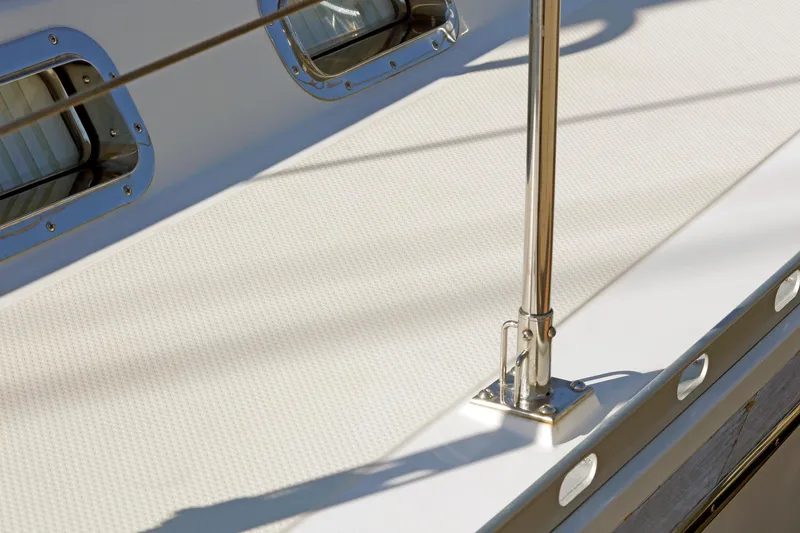 Slide: The Image of Deck of 2012 Hylas 49CC yacht with stainless steel railing and windows. - 33