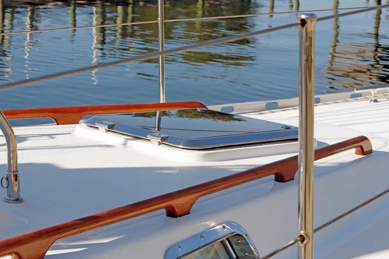 Slide: The Image of Deck of 2012 Hylas 49CC yacht with polished wood and metal details. - 34