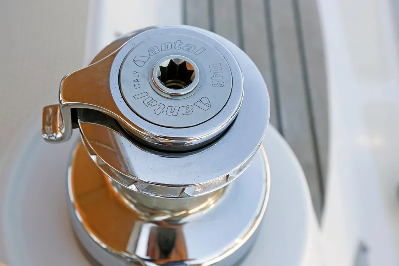 Slide: The Image of Close-up of a shiny Antal winch on a 2012 Hylas 49CC yacht deck. - 41