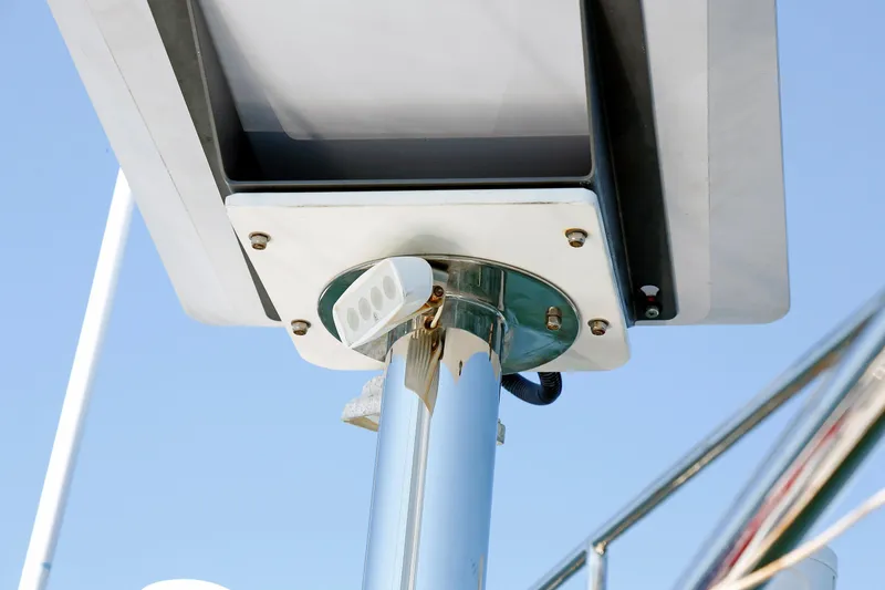 Slide: The Image of Close-up of a Hylas 49CC yacht's radar mount, 2012 model, against a clear blue sky. - 42