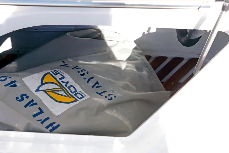 Slide: The Image of Hylas 49CC sail cover in storage compartment, 2012 model. - 52
