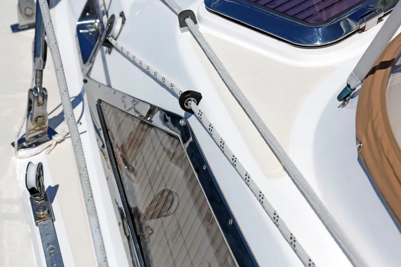 Slide: The Image of Close-up of 2012 Hylas 49CC yacht deck with ropes and fittings. - 59