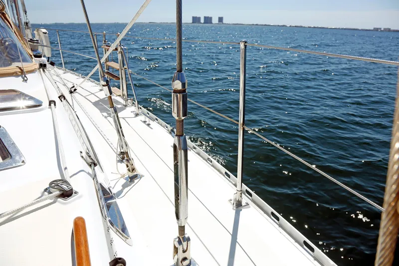 Slide: The Image of Sailboat deck on water, Hylas 49CC, 2012 model, sunny day, ocean view. - 63