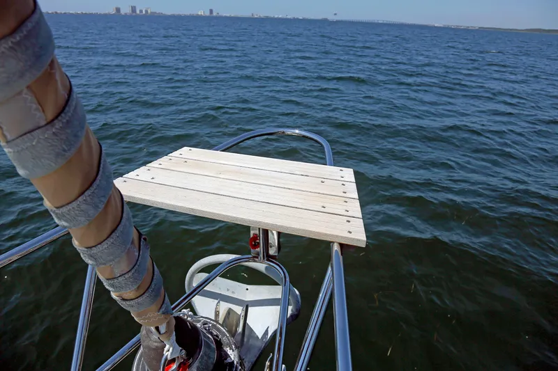 Slide: The Image of Sailboat bow with wooden platform on open water, Hylas 49CC, 2012 model. - 68