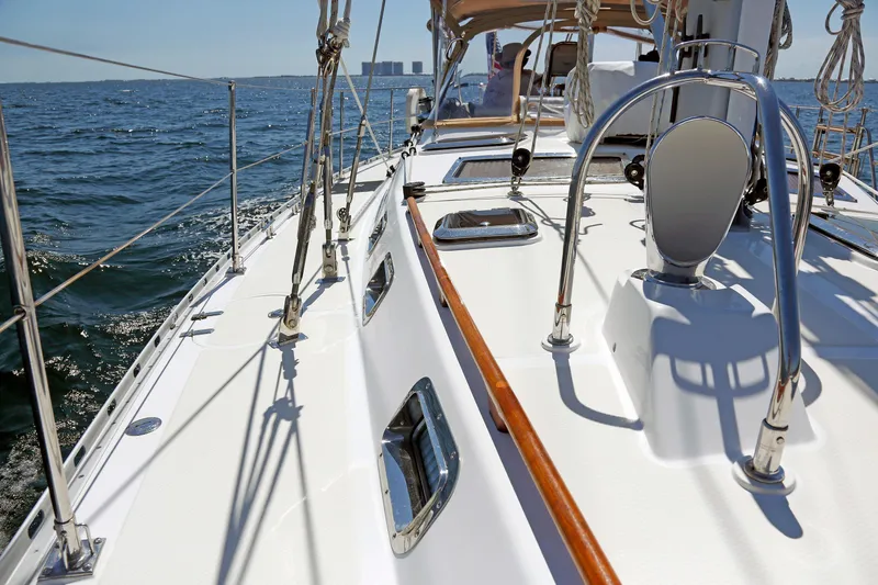 Slide: The Image of Sailing on a 2012 Hylas 49CC yacht, showcasing deck details and ocean view. - 71