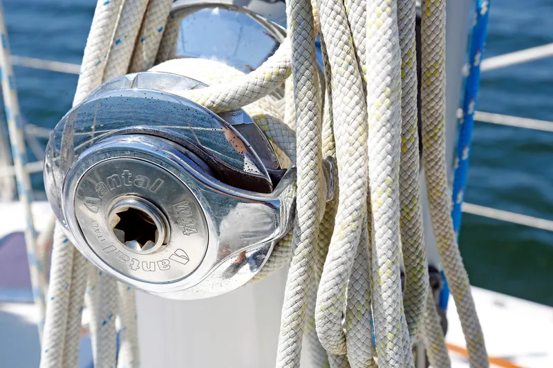 Slide: The Image of Close-up of a winch with ropes on a 2012 Hylas 49CC sailboat. - 77