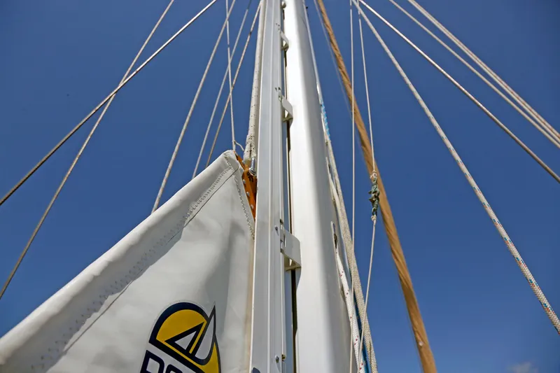 Slide: The Image of Sailboat mast and rigging on a 2012 Hylas 49CC under clear blue sky. - 83